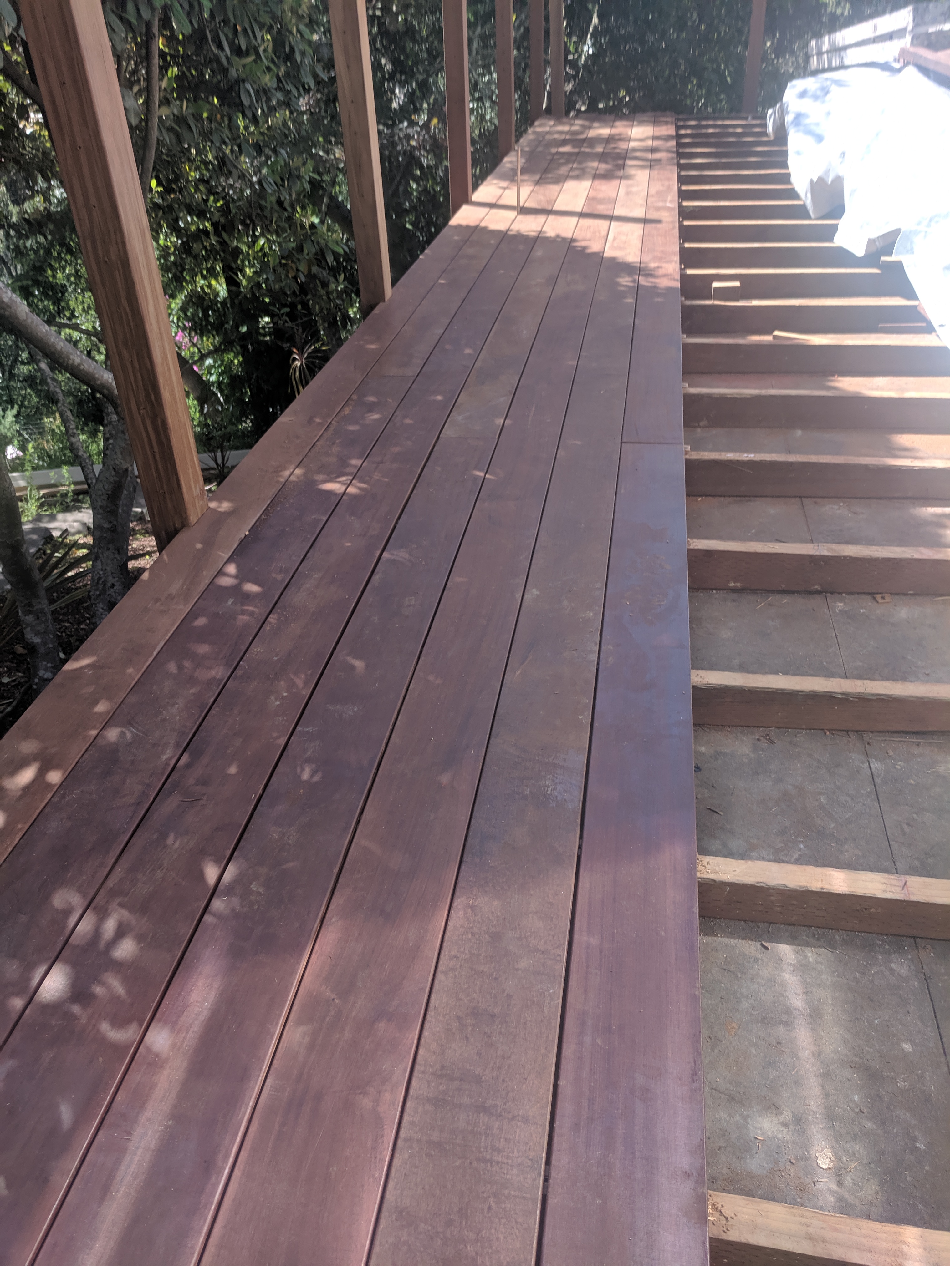 In the process of applying a floating redwood wooden deck in Corte Madera, Marin County, CA. 